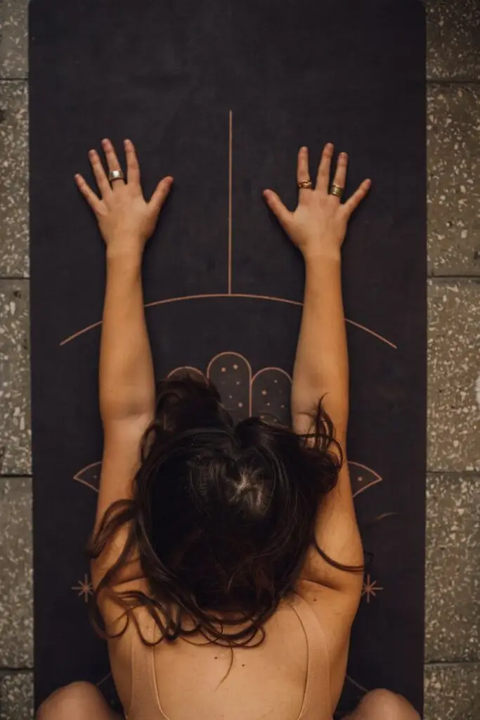 overhead shot of a woman meditating